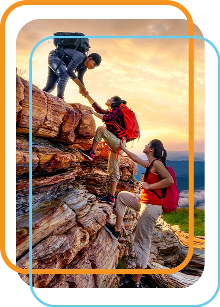 Photo of a trio of young people hiking at sunset. All are wearing backpacks, and the young woman in the middle is being helped up by the young man at the top of the climb and the young woman below her.