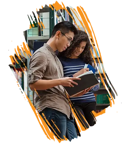 photo of high school students reviewing notes together in a library (help students learn with the Education Revolution!)