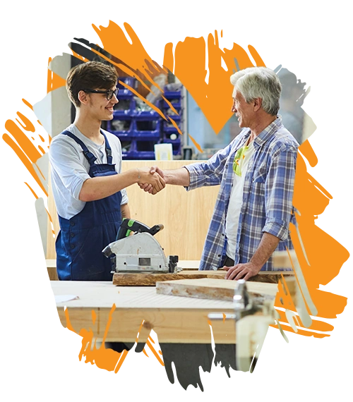 stylized photo of a high school student in a wood shop class shaking hands with his teacher in a flannel shirt (Education Revolution Association - Challenge)